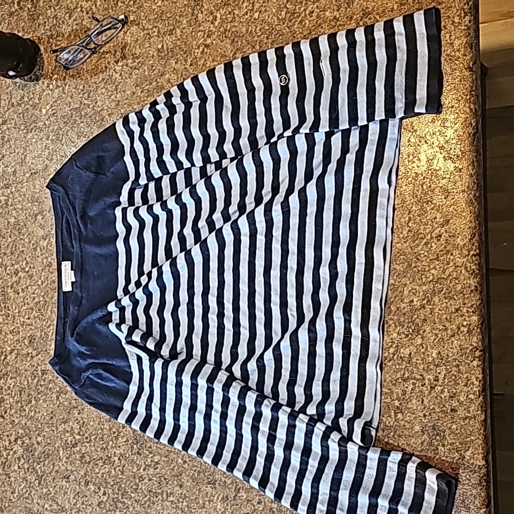 A stripped women's sweater large